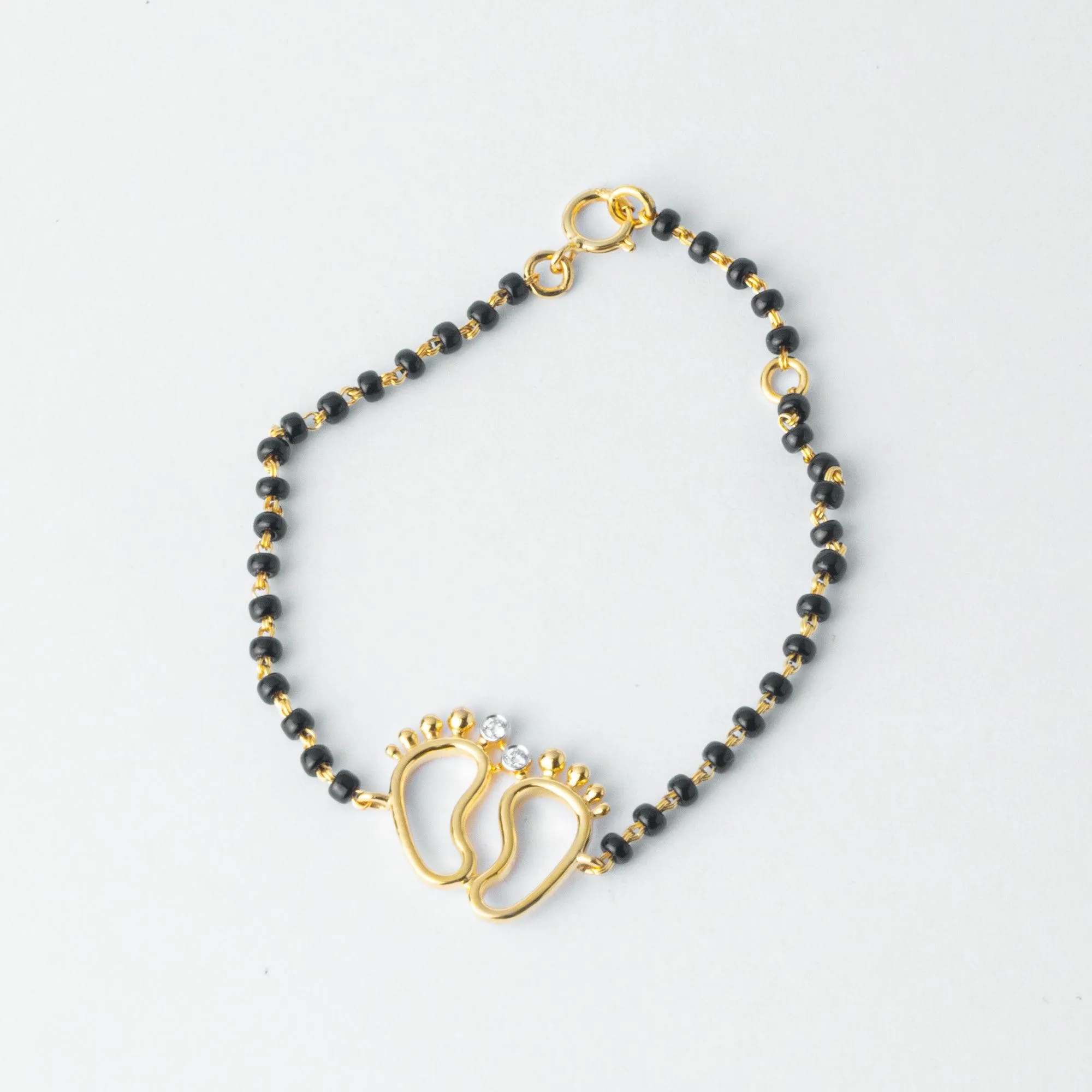 18ct Yellow Gold / 18ct White Gold Diamond Adjustable Children's Bracelet with Small Feet and Black Beads MCS4275