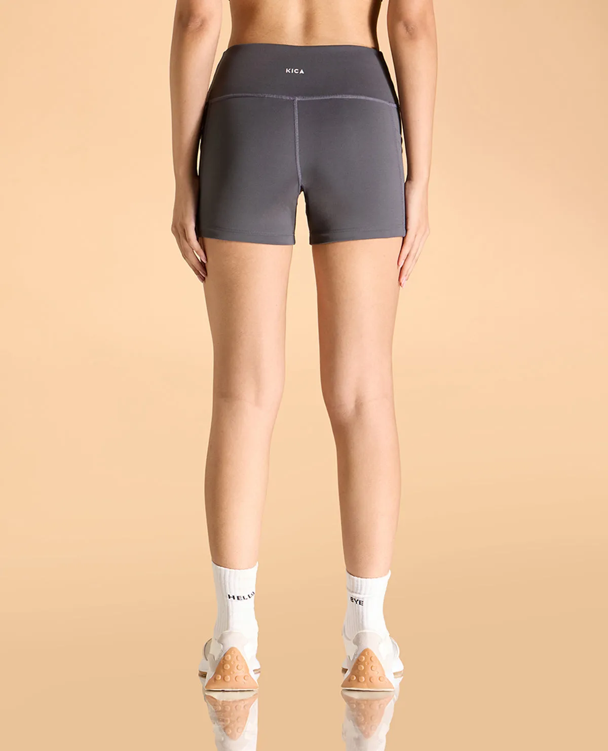 Strappy Sports Bra and Second SKN Booty Shorts